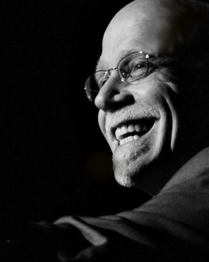 Michael Ammar smiling on stage