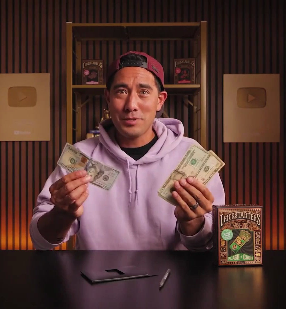 Zach King holding up the cash from Flash Cash